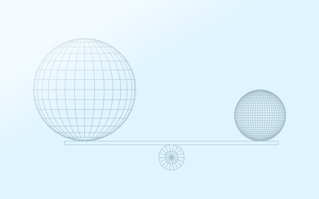 two different size balls balancing each other