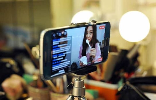 Picture of a livestreamer recording