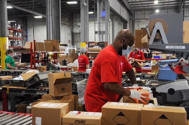 shop employees working on deliveries