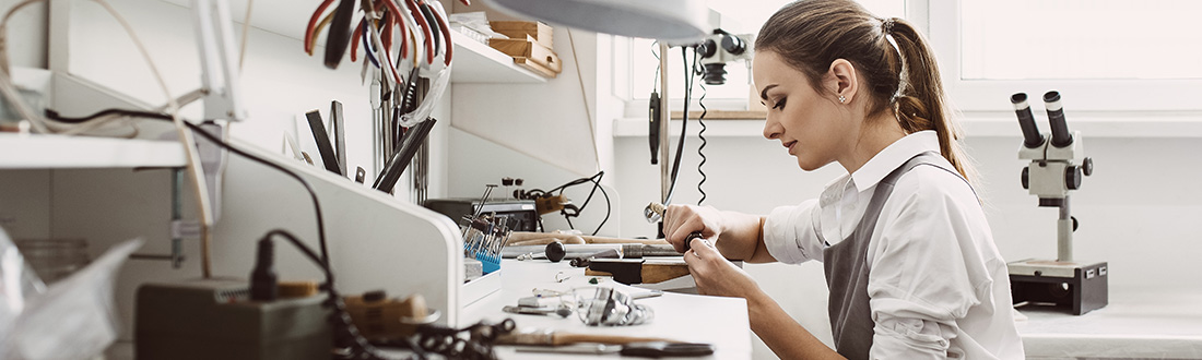 woman workin on jewelry