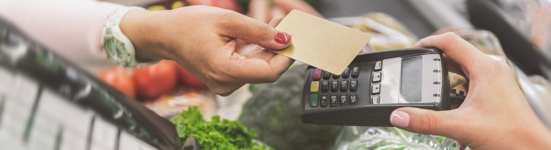 buying with credit card at groceries store